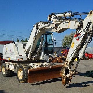 CASE WX 145 - Gumikerekes kotrógép