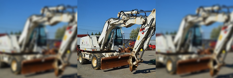 CASE WX 145 - Gumikerekes kotrógép