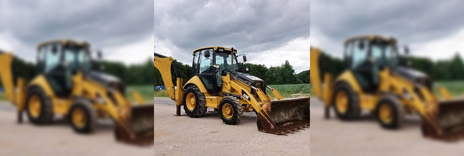 CATERPILLAR 428E - Kotró-Rakodógép