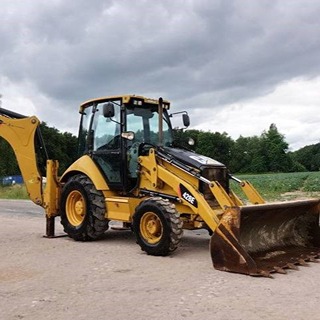 CATERPILLAR 428E - Kotró-Rakodógép